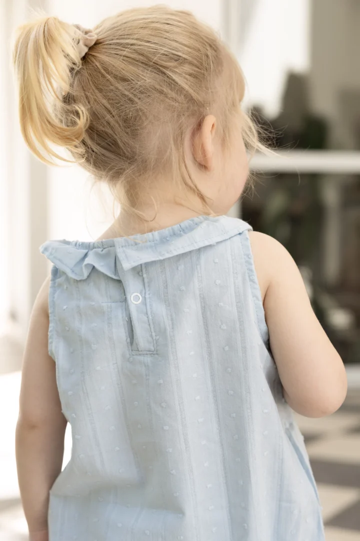 BODY CON CUELLITO SIN MANGAS - CELESTE